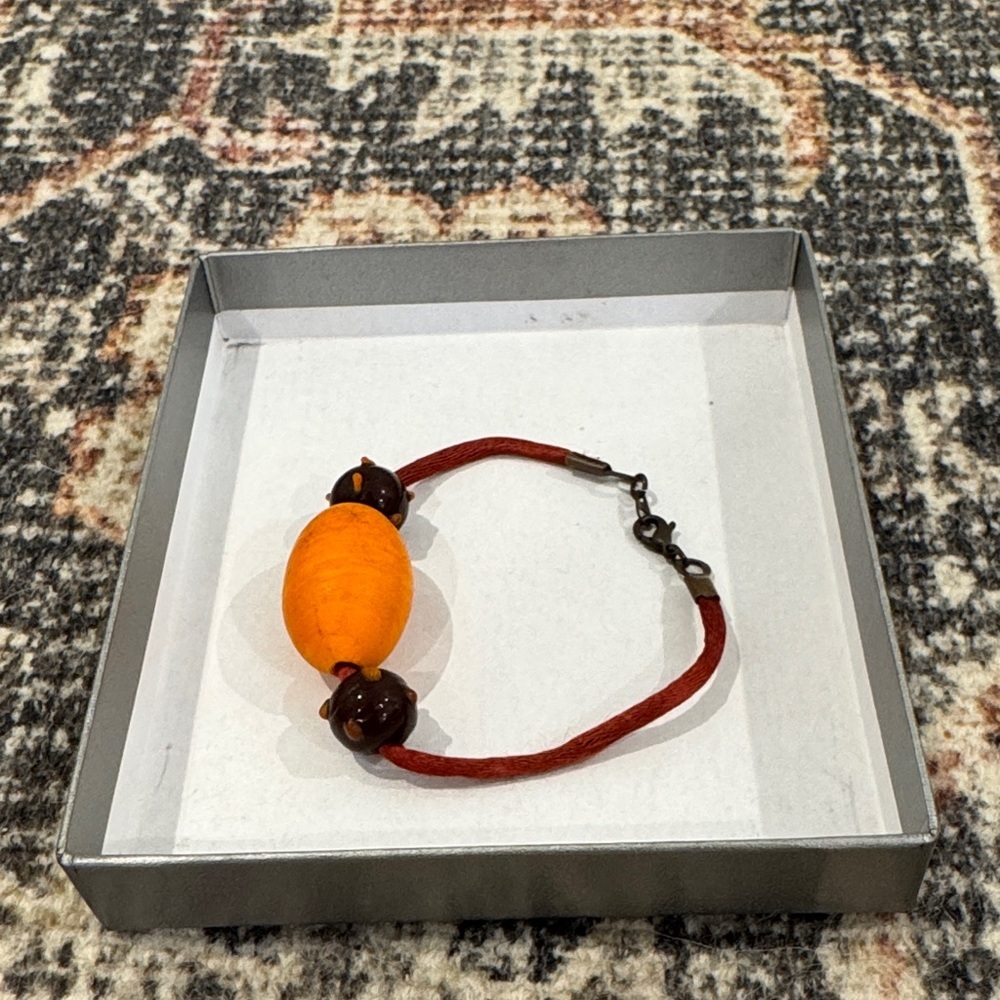 Orange and Brown Bracelet with Clasp Closure